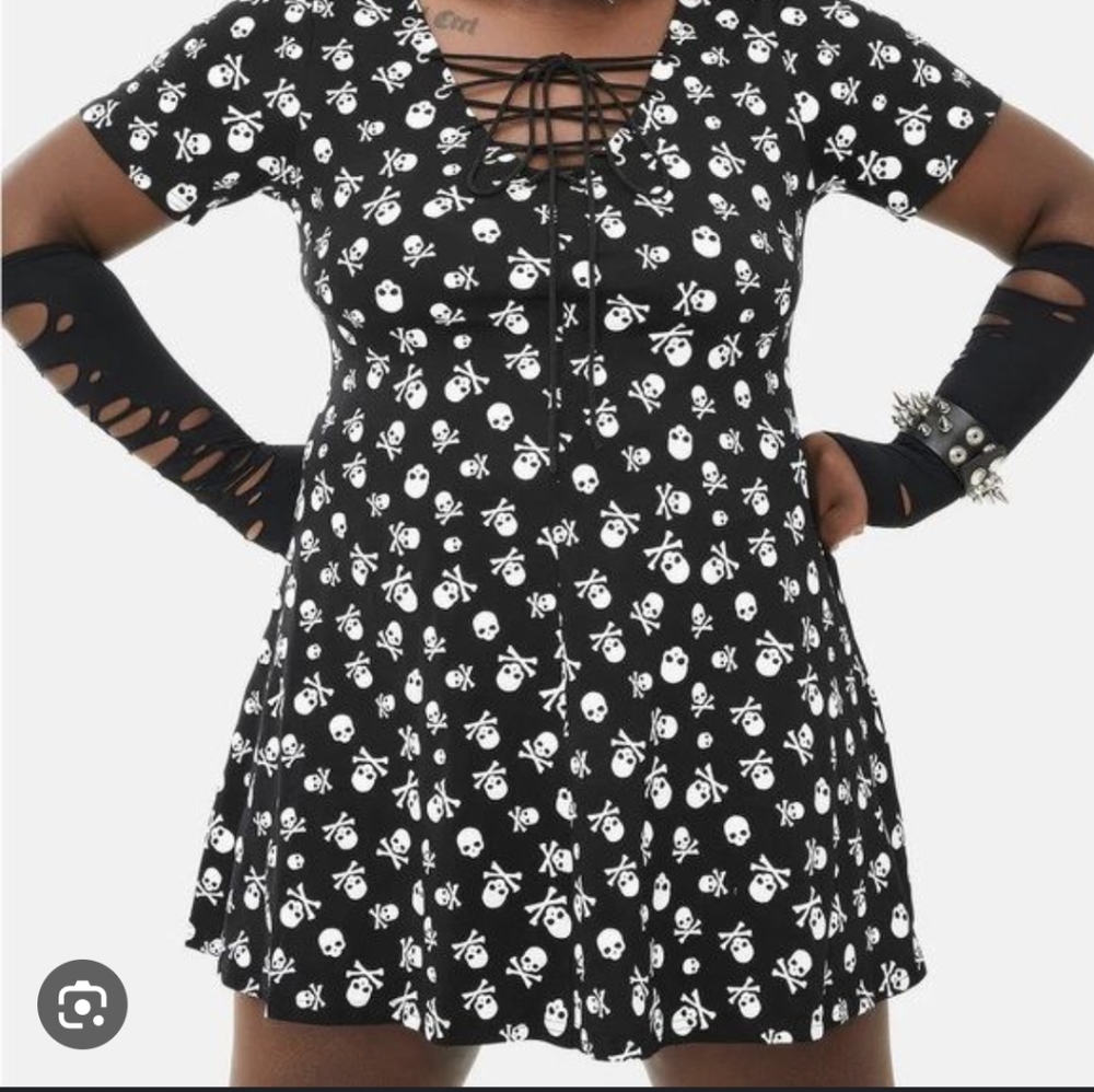 Skull print lace up skater dress